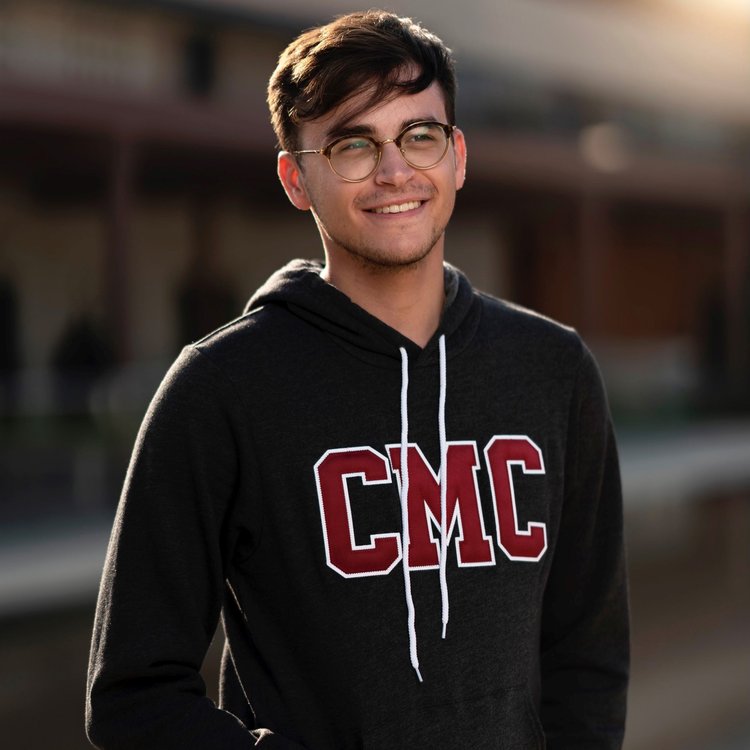 Man wearing CMC hoodie